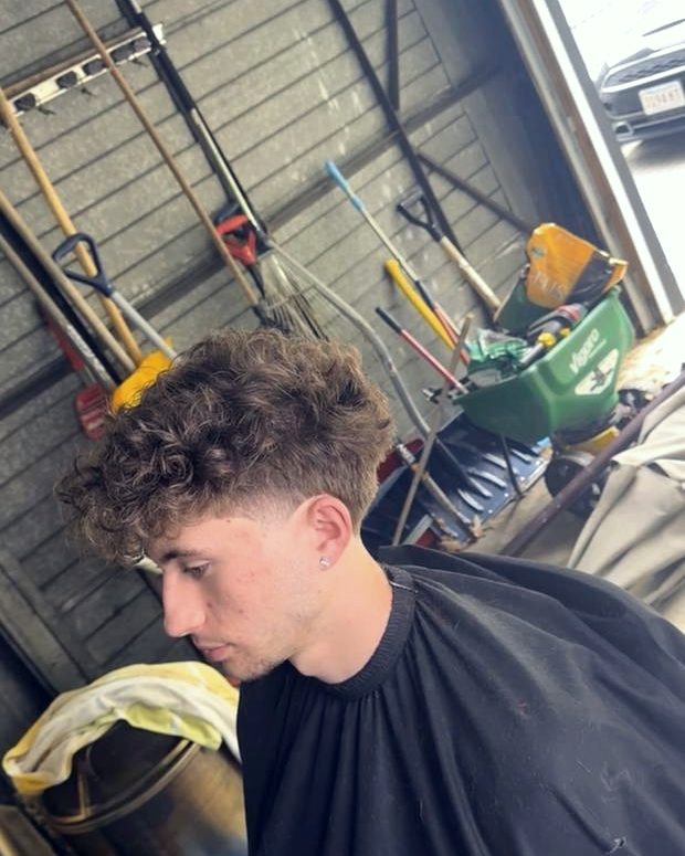 Curly fade by Parker